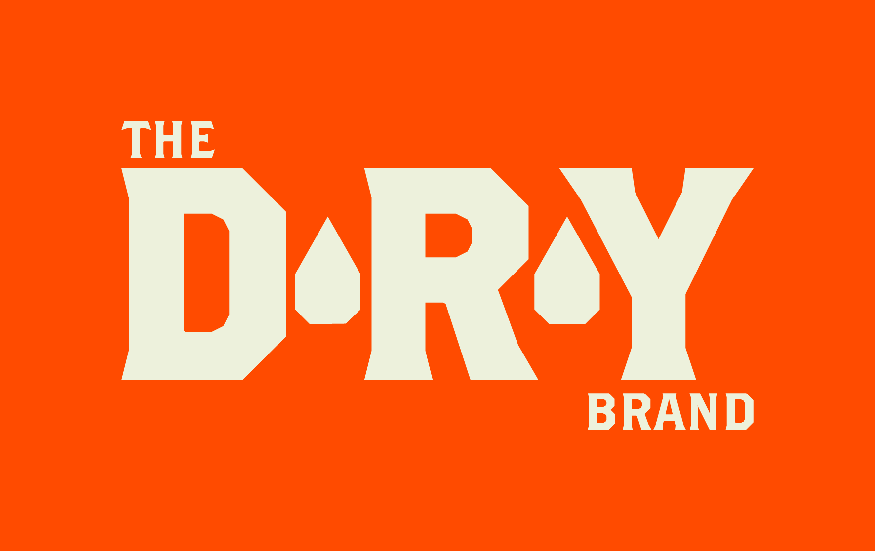 Logo for The Dry Brand with orange background and large beige text reading 'DRY', with smaller beige text 'THE' above and 'BRAND' below.