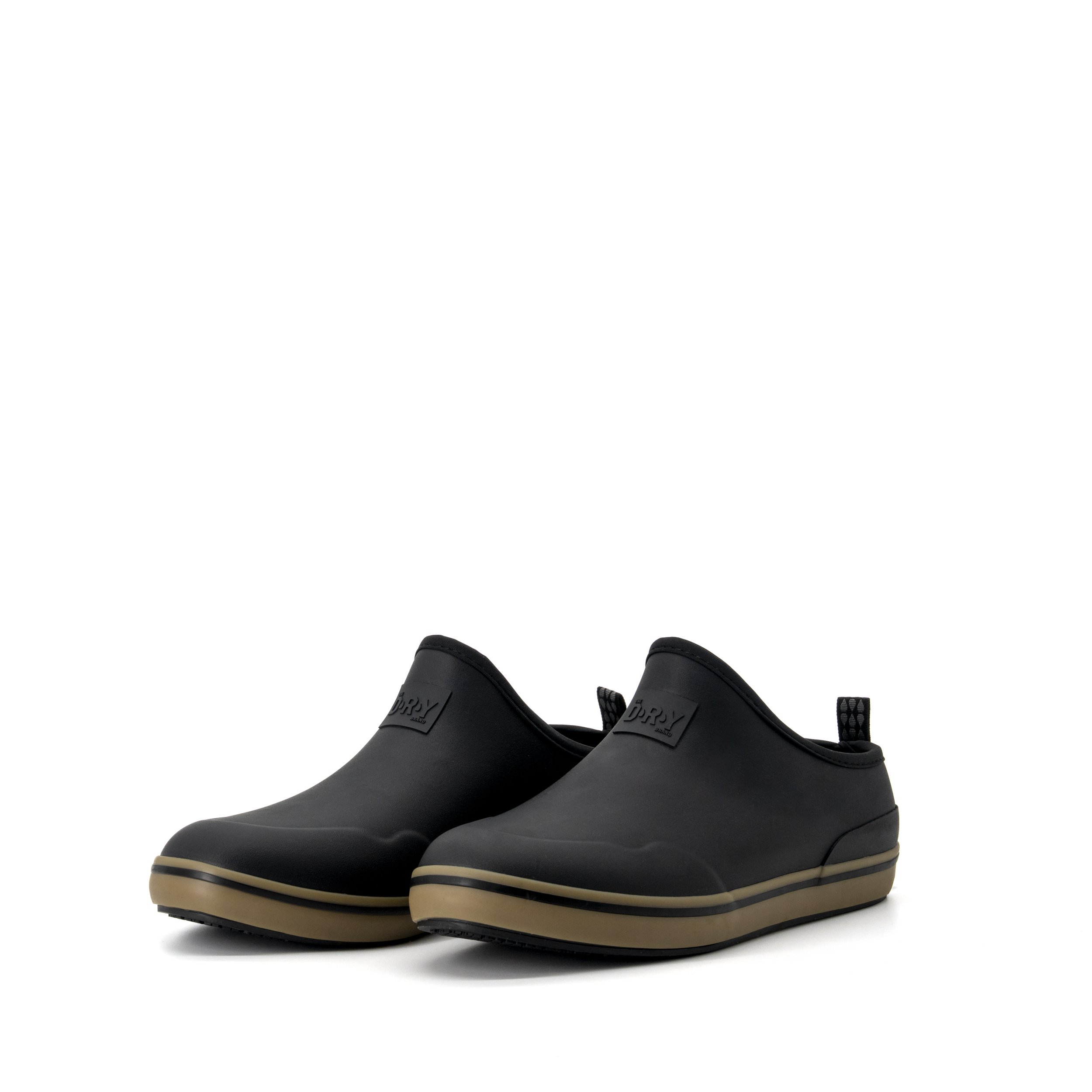 Pair of black slip-on shoes with beige soles on white background.