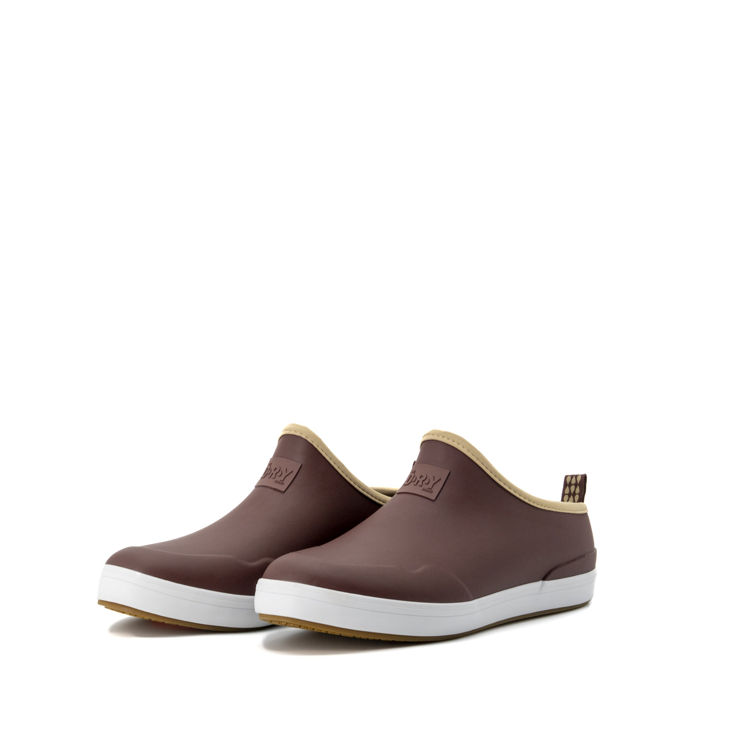 Pair of brown slip-on shoes with beige trim and white soles.