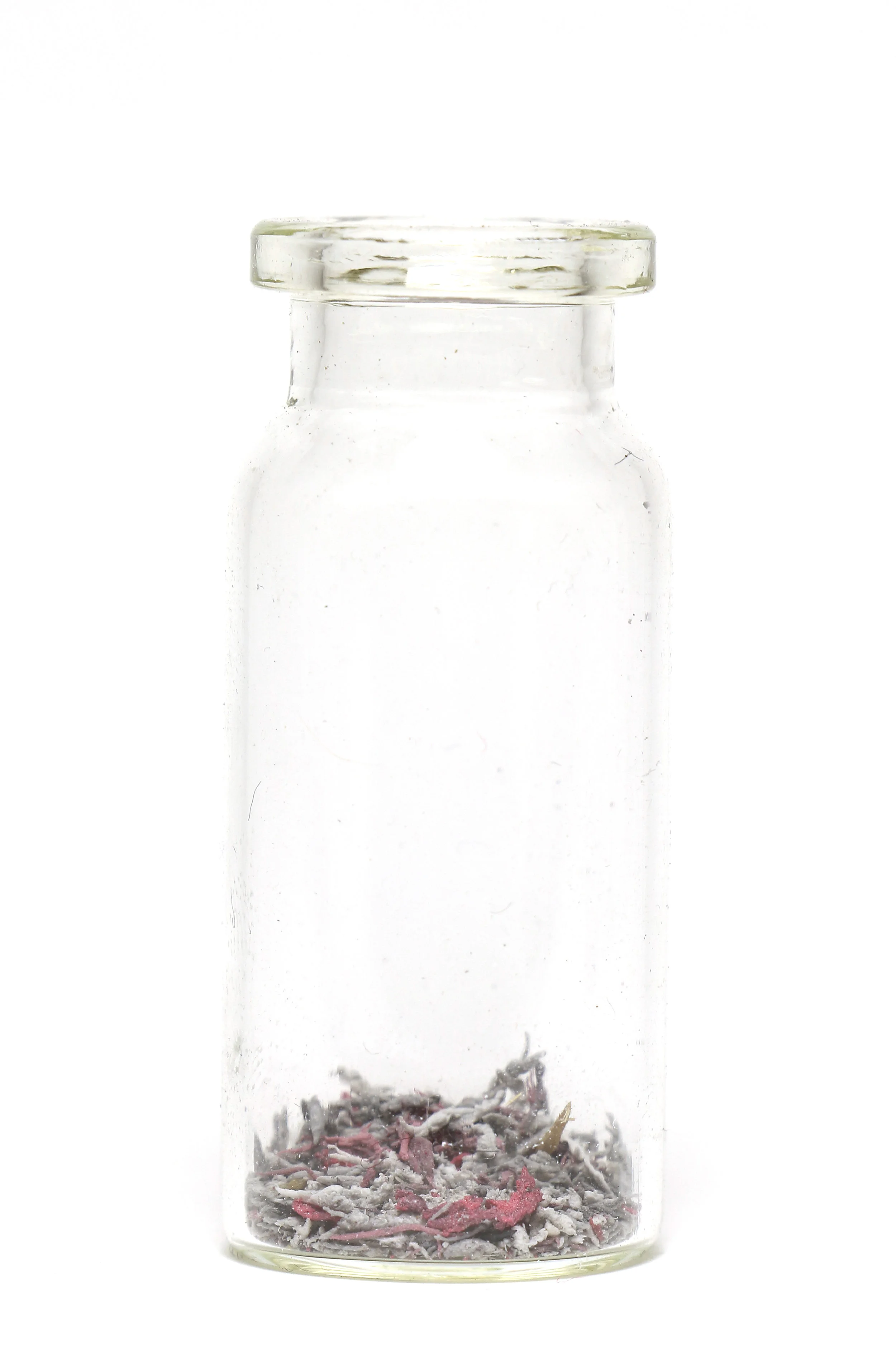 Old Self, New Self (Remnants) Graphite, eraser, paper, glass jar, 1" x 1" x 3", 2018.