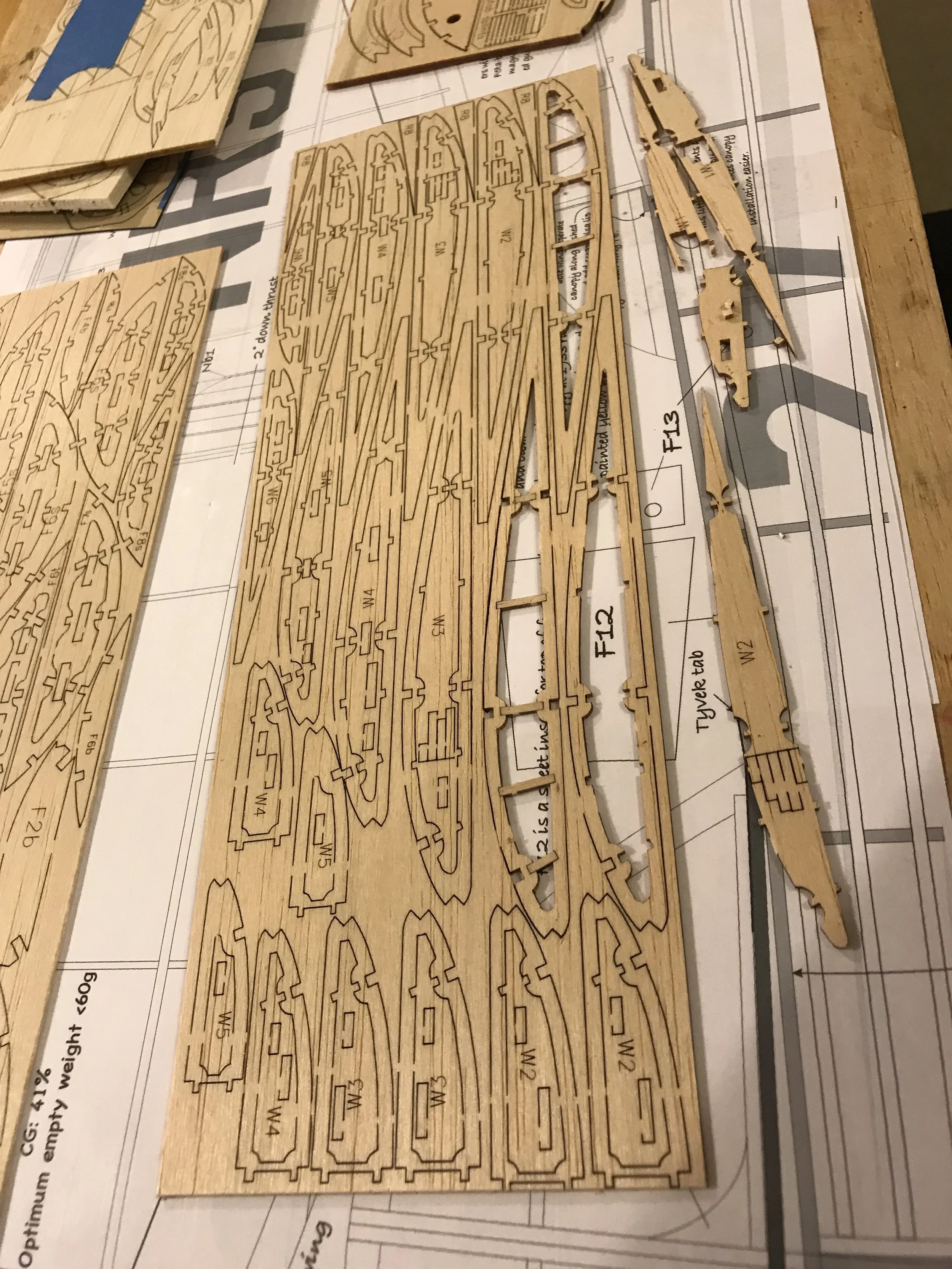assemble ribs while still held in carrier sheet