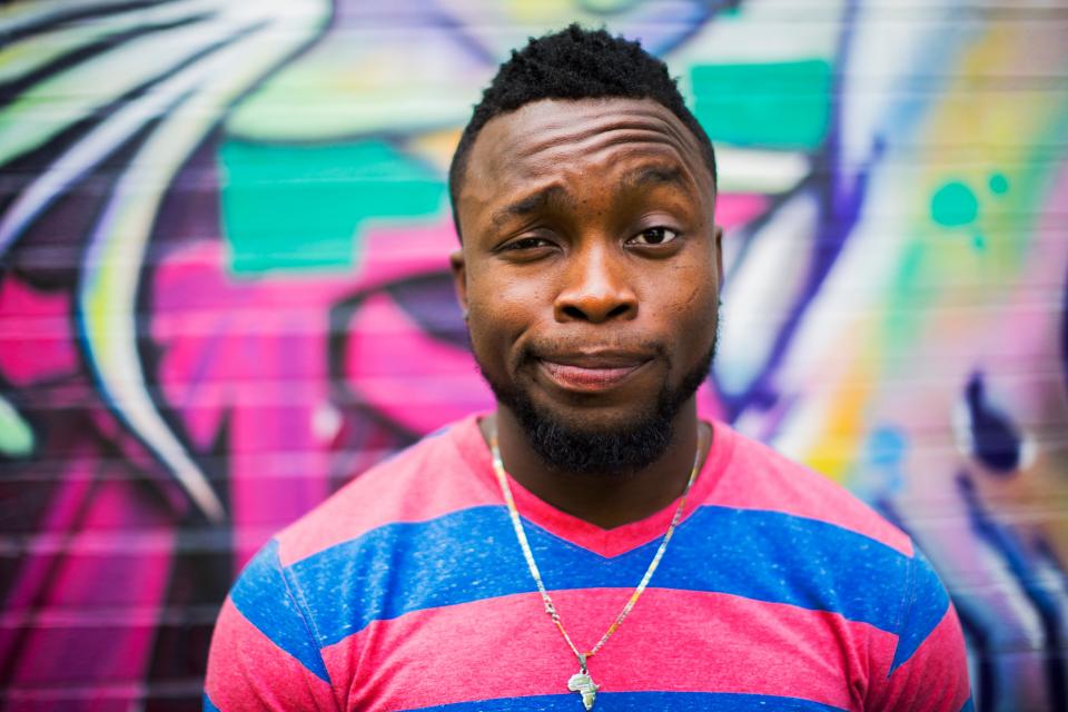 Black Man in Striped Shirt.jpg