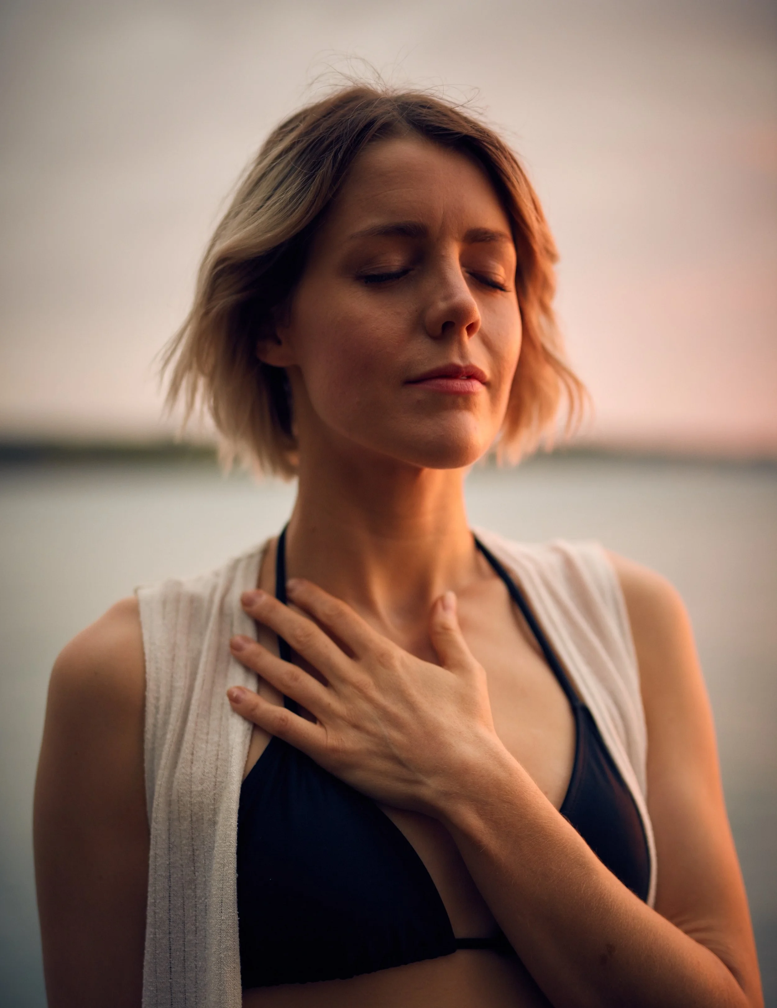 Serious Illness and Caregiver. Breath Tool. Woman with her Hand on her heart.