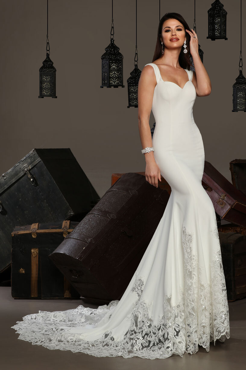 Designer fit and flare wedding gown