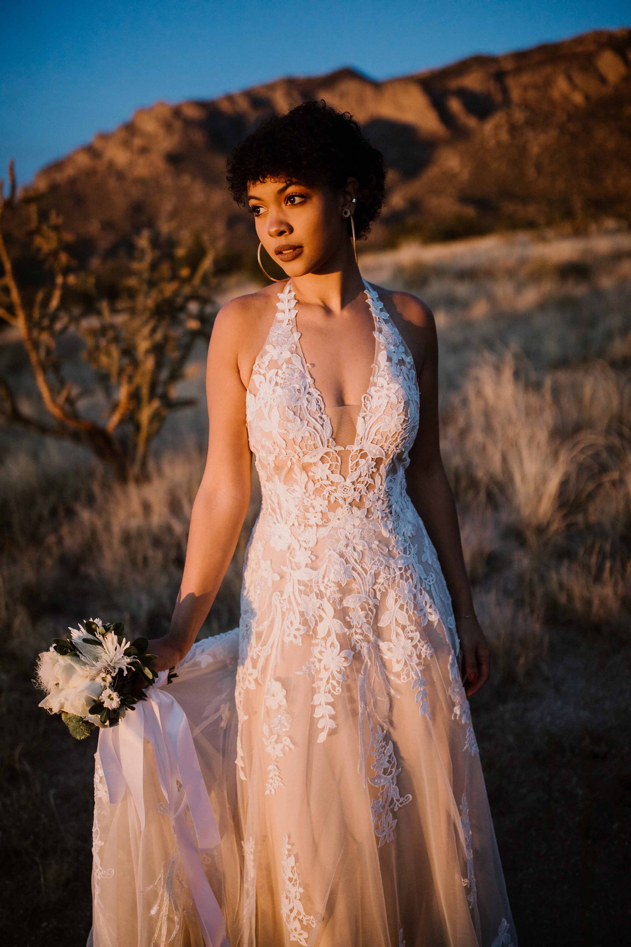 Wedding dress with plunging neckline and lace