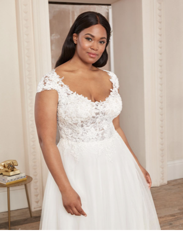 wedding dresses from Adore new  Uptown Bride