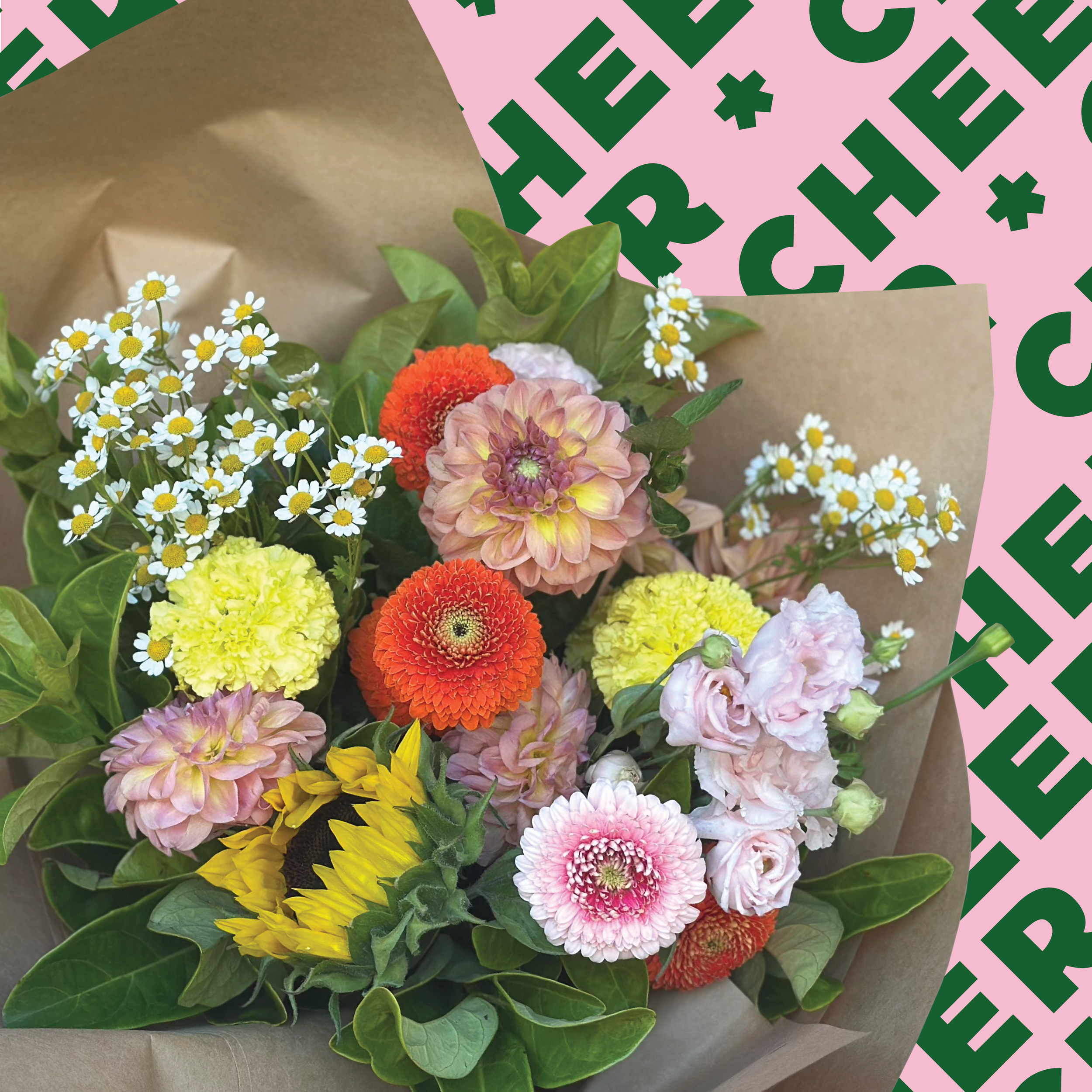 Bright and cheerful mixed flower bouquet featuring colourful seasonal blooms by Fleur Social.