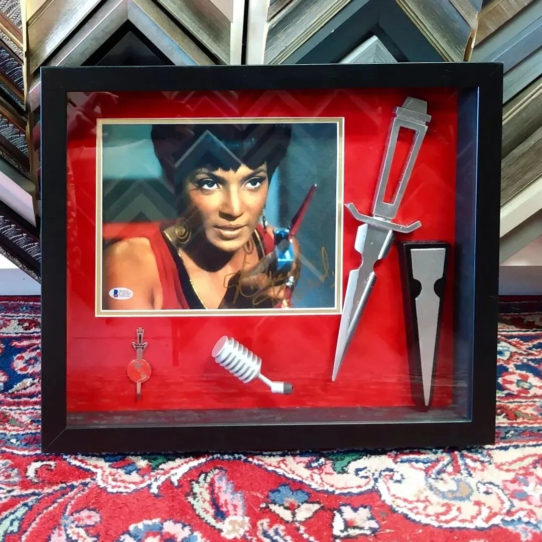Rest in Peace Nichelle Nichols; your role as Nyota Uhura in Star Trek is highly treasured here at Studio 71.

Here we have a signed photo of her in the famed episode &quot;Mirror, Mirror,&quot; along with some prop replicas; this is for sale. Stop in