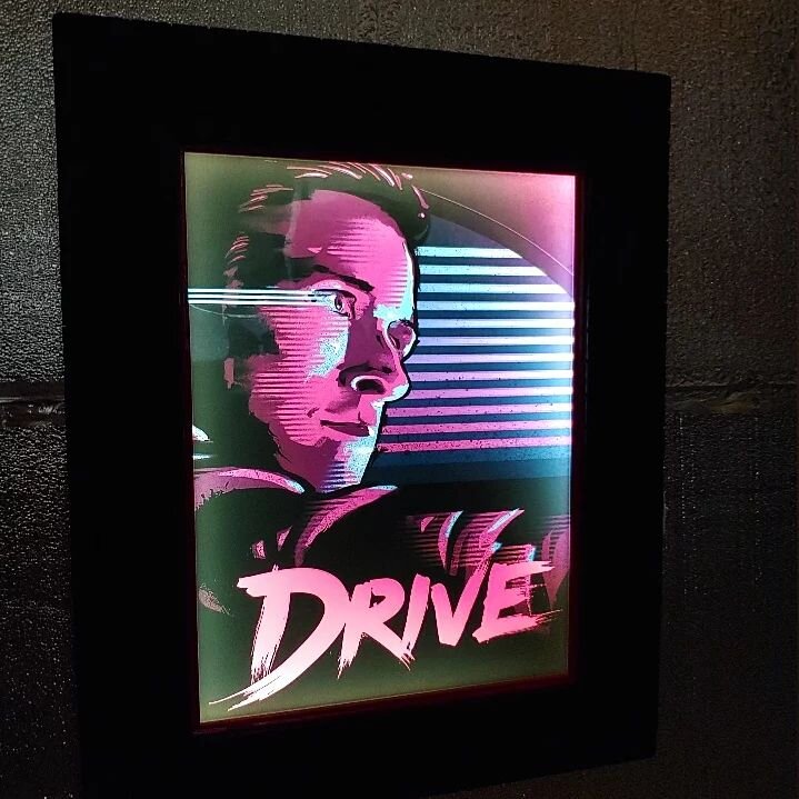 Drive safe this holiday weekend!!

Check out the awesome custom framing on this poster for the 2011 movie &quot;Drive&quot;! The whole frame is built from scratch to look like a tire, and there's lights on the inside to make it feel like it came stra