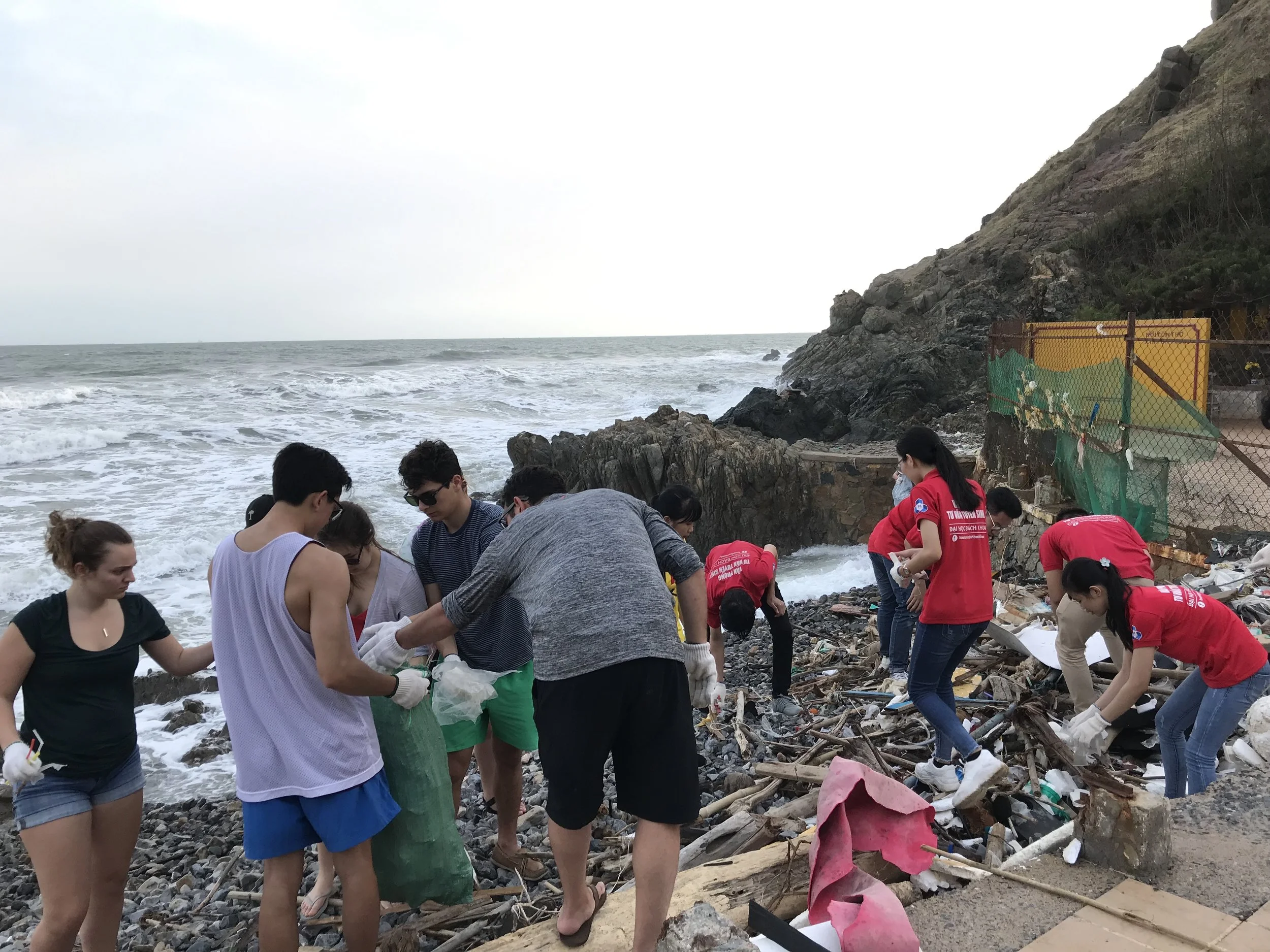 American and Vietnamese students join for a beach clean-up.