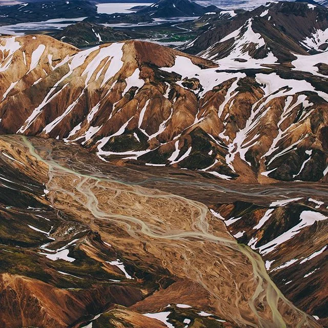 Imagine hanging out of the window of a little airplane several hundred feet in the air, while you can't even feel your hands or face because of the wind chill. That might sound a little crazy, but when you capture an image like this... It makes it ab