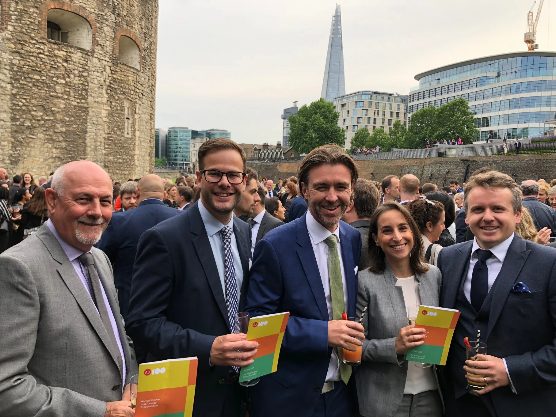 Team rg+p celebrate their New Member of the Year Award at the Tower of London (l-r) Melvyn King, Rob Woolston, James Badley, Victoria Torres and Grant Giblett.