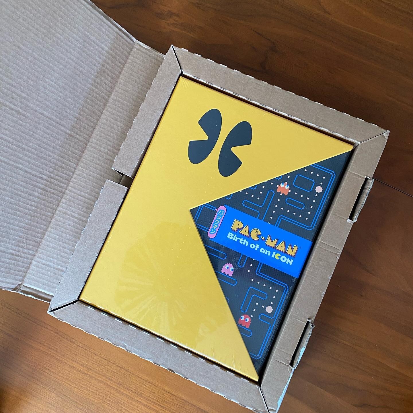 Just arrived the beautiful @cookandbecker &ldquo;Pac -Man: Birth of an Icon. A fantastic hardbound book, a 7&rdquo; Recording of Buckner and Garcia&rsquo;s &ldquo;Pac-Man Fever&rdquo;, and cool arcade token with Pac-Man on one side and ghost on the o