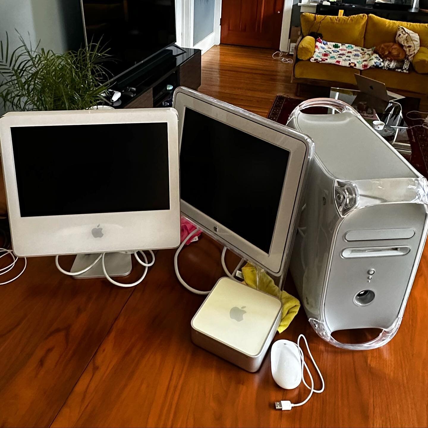 A trio of early 2000s #macintosh computers. From left to right, White 17&rdquo; iMac G5, 17&rdquo; Studio Display (M7649), Power Mac G4 Quicksilver, and an early 2000s Mac Mini. These machines date between 2002 and 2006 a time many regard as a low po