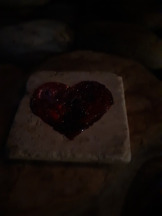 love is everywhere 6 of 8, 10 2020, photography  set of 8 images oil on travertine, items in my yard,.jpg