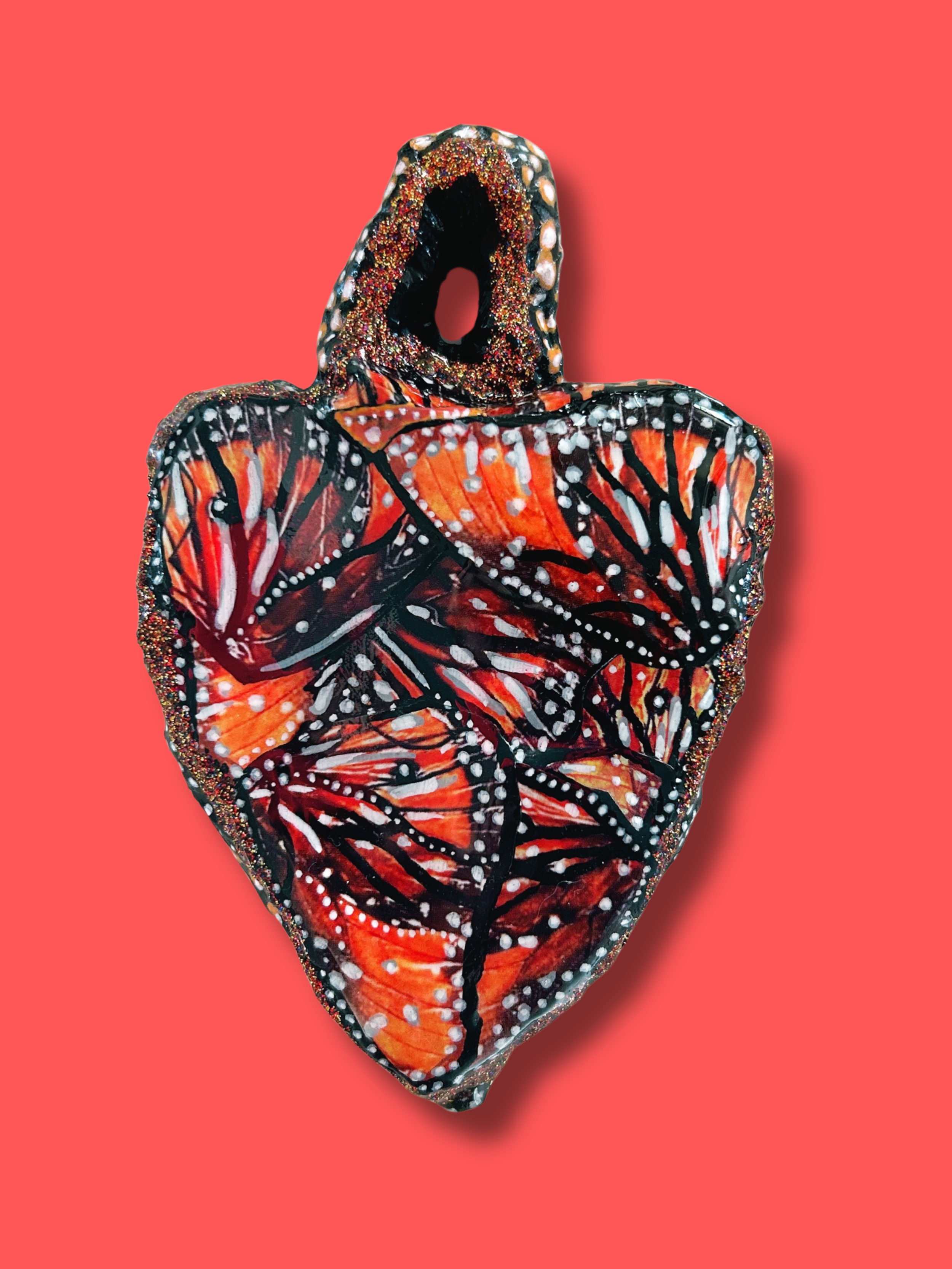 Sculptural heart with painted butterfly wings