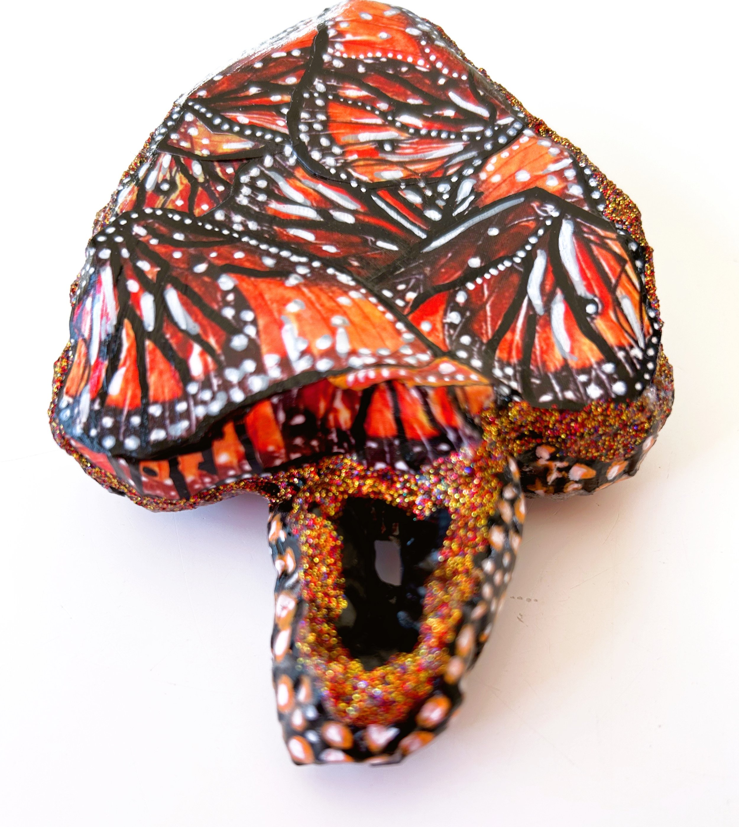 Sculptural heart with painted butterfly wings