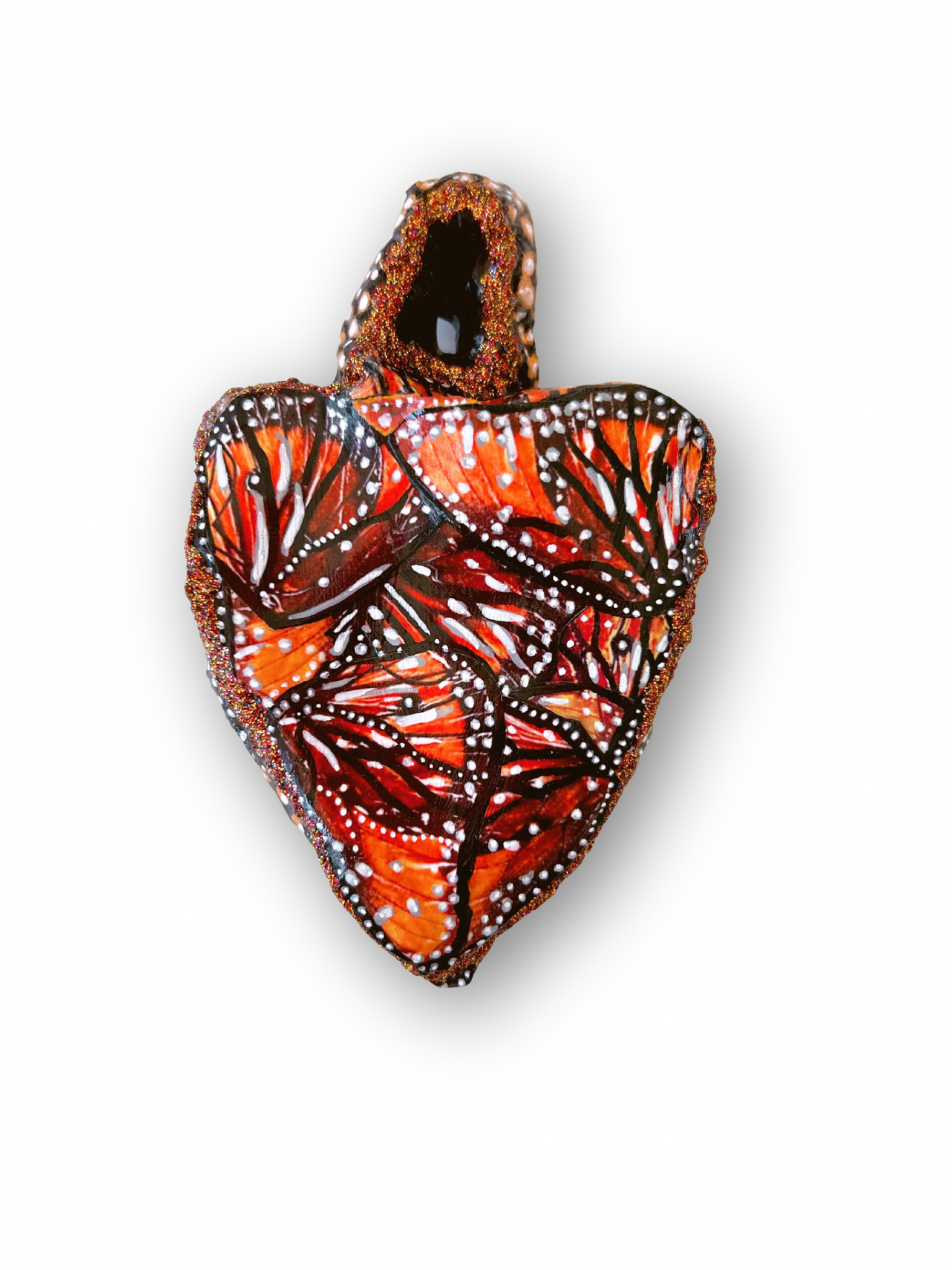 Sculptural heart with painted butterfly wings