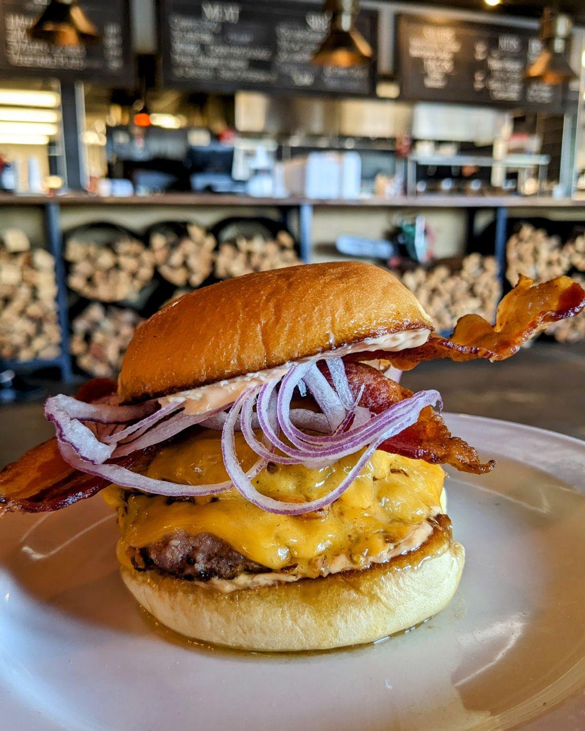 Better start making your dinner plans! This burger is drool worthy.

THURSDAY (4/25) SMOKEHOUSE SPECIAL
ALL DAY- - - Double smash burger, cheddar cheese, bacon, thin-sliced red onion, buffalo garlic mayo

#smokemeateveryday #weeklyspecials #AlamanceN