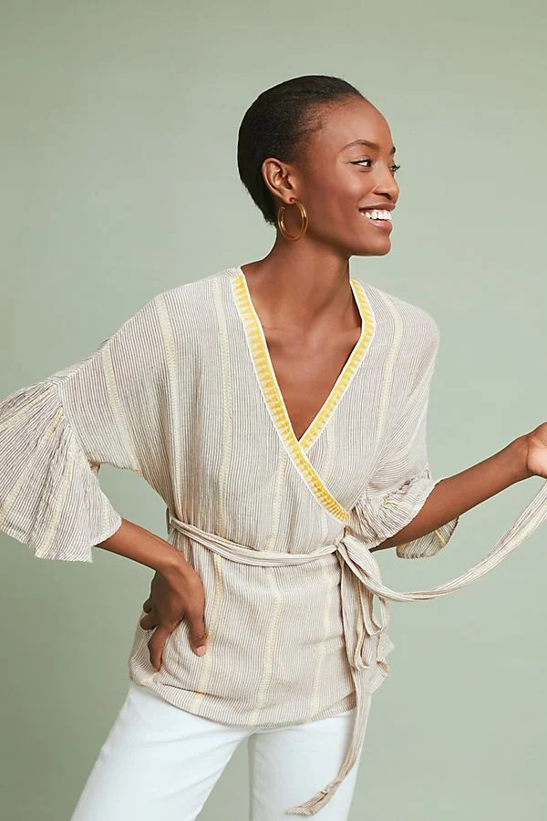 What are some nice tops that look and feel good on my "football shoulders?"