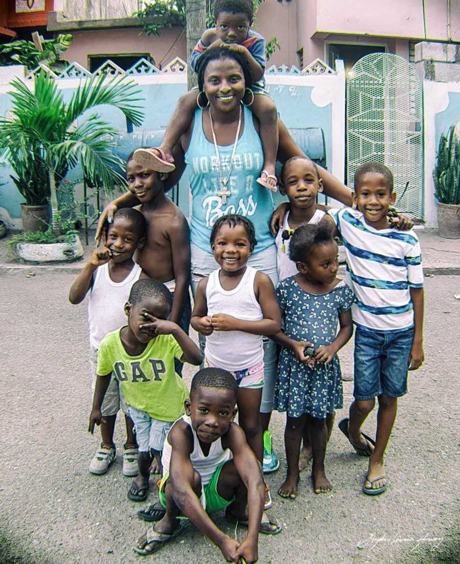 Queen Kamarla with kids from Trenchtown