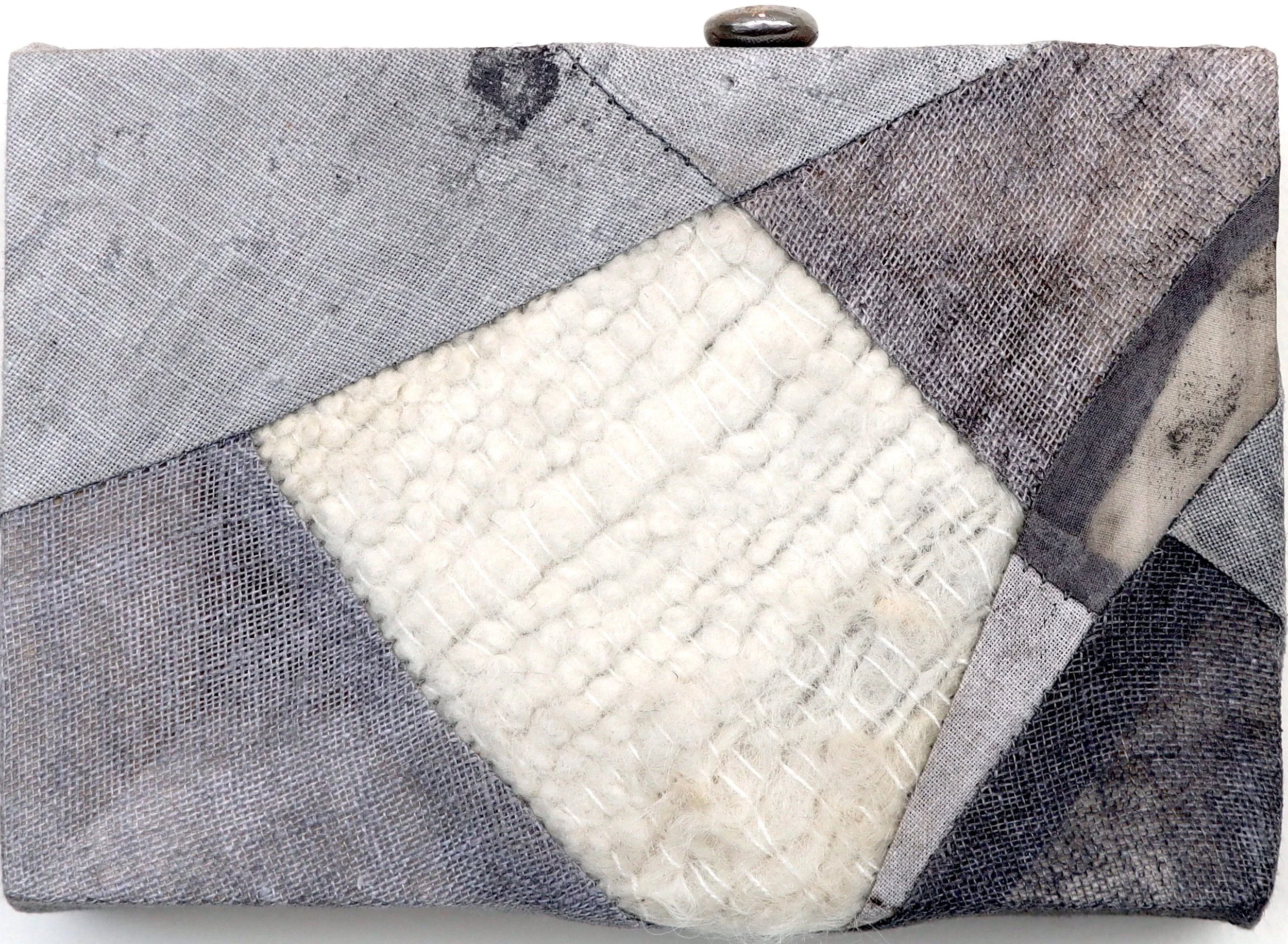   Geologies 3 , 2022 Wool, silk, linen, pigment, stone cast into steel Approx: 4.15” x 6”    