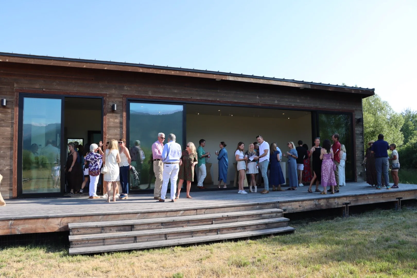 Natalie Clark Opening from Yard back to deck.JPG