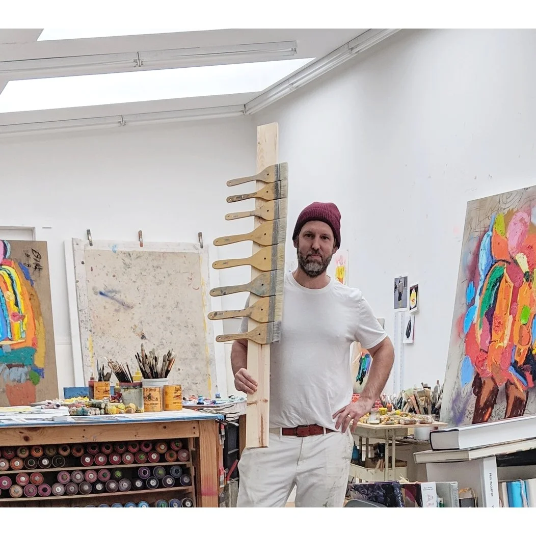 MarcHorowitz_Portrait_in Studio with Brushes.jpg