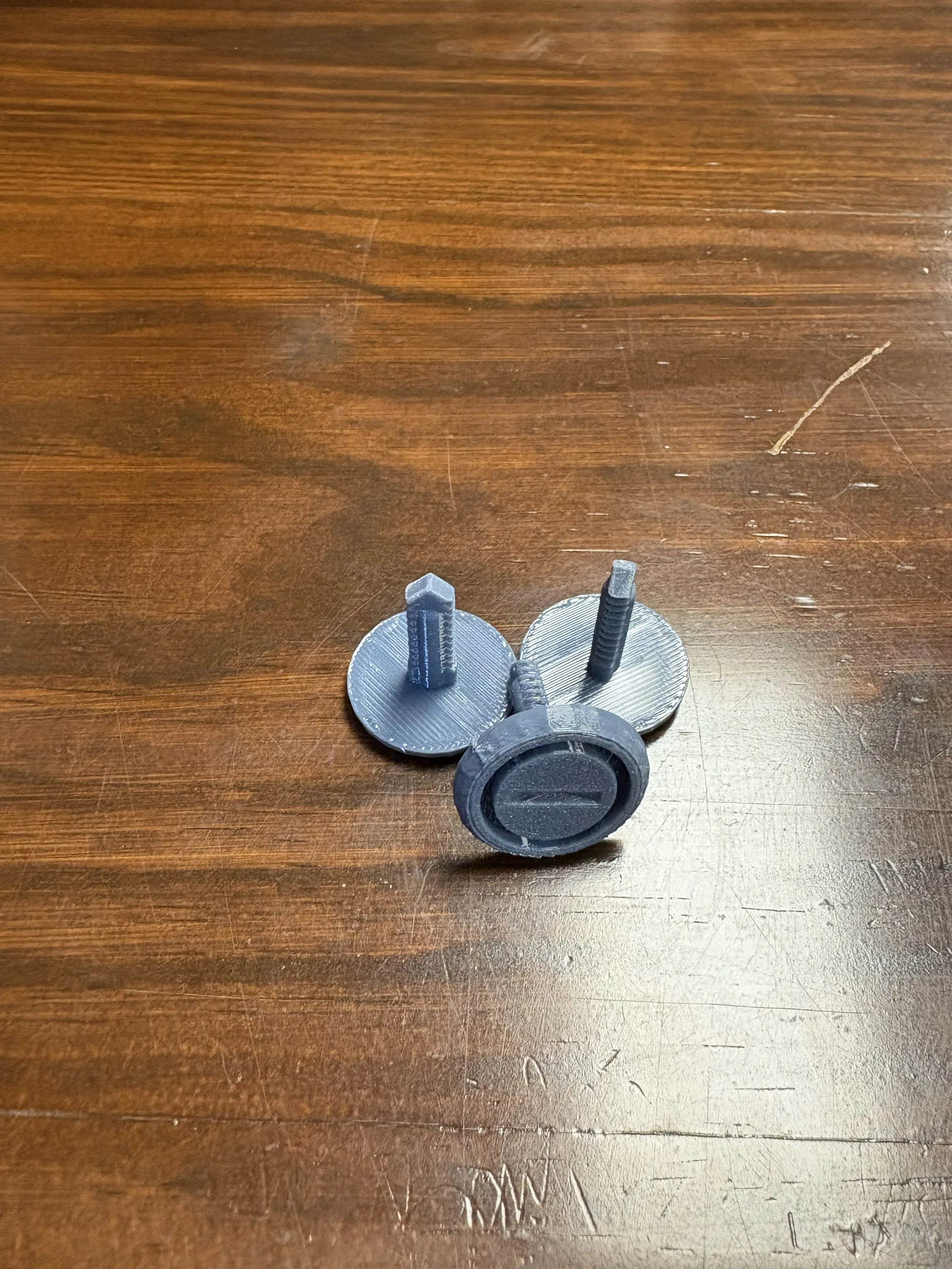 S130 Grey Rear Latch Trim Screws.jpg