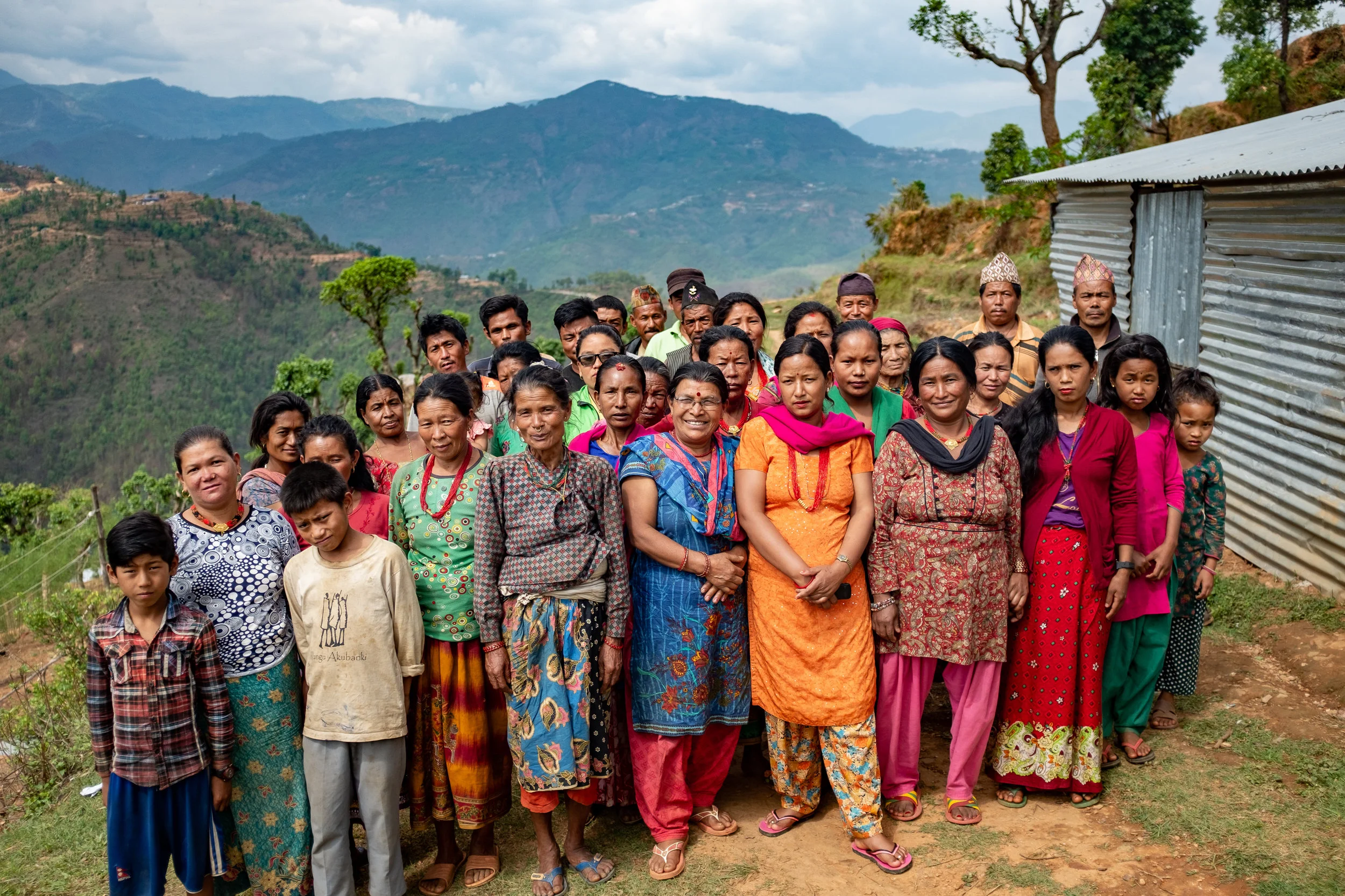 Self-help groups like this one in Upper Bhotsipa are helping men and women save money and make loans, addressing some of the areas that made recovery difficult after the earthquake.