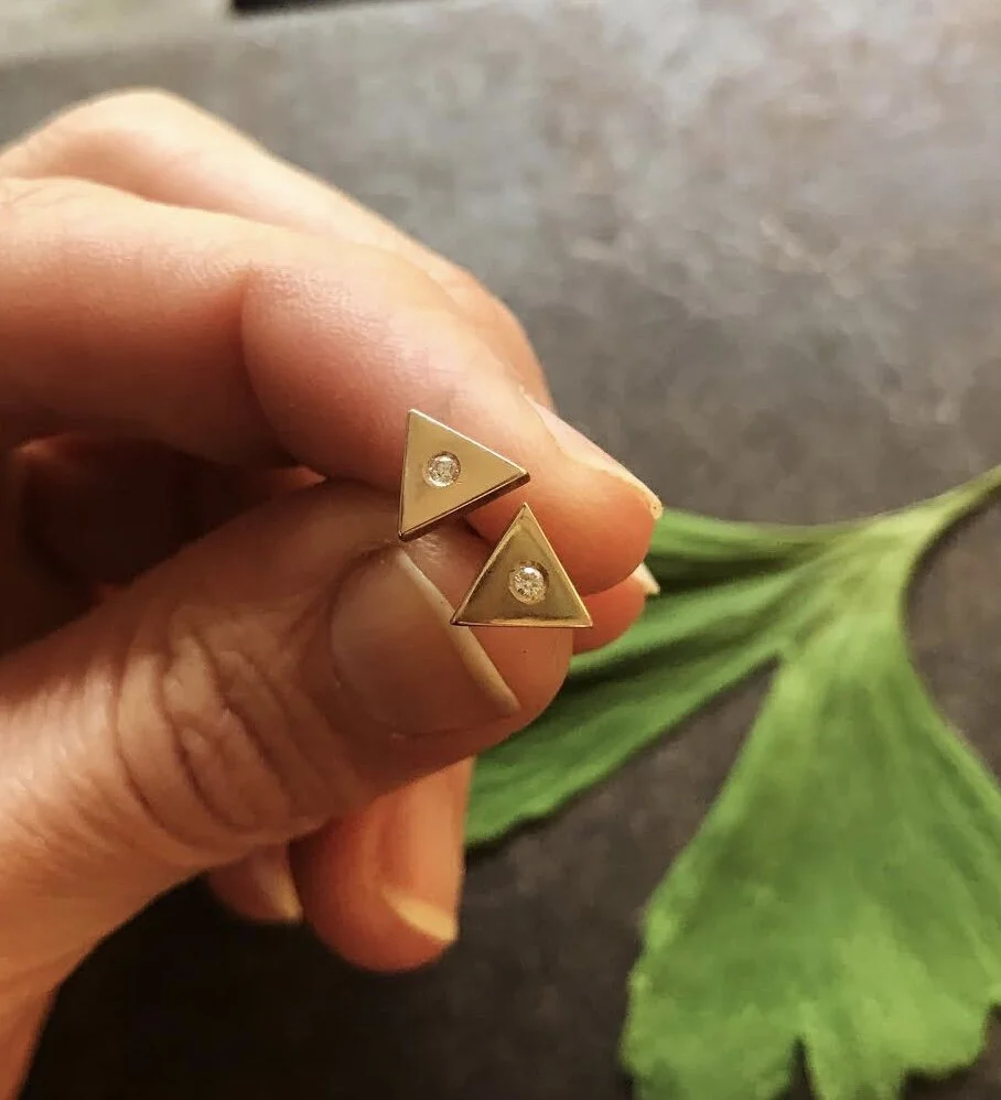 14kt Gold earrings with flush set diamonds