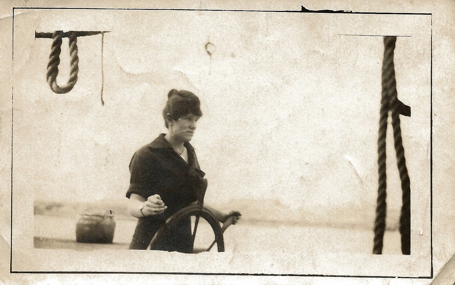 This is Bertha at the helm of some vessel. No doubt she threw the captain overboard.