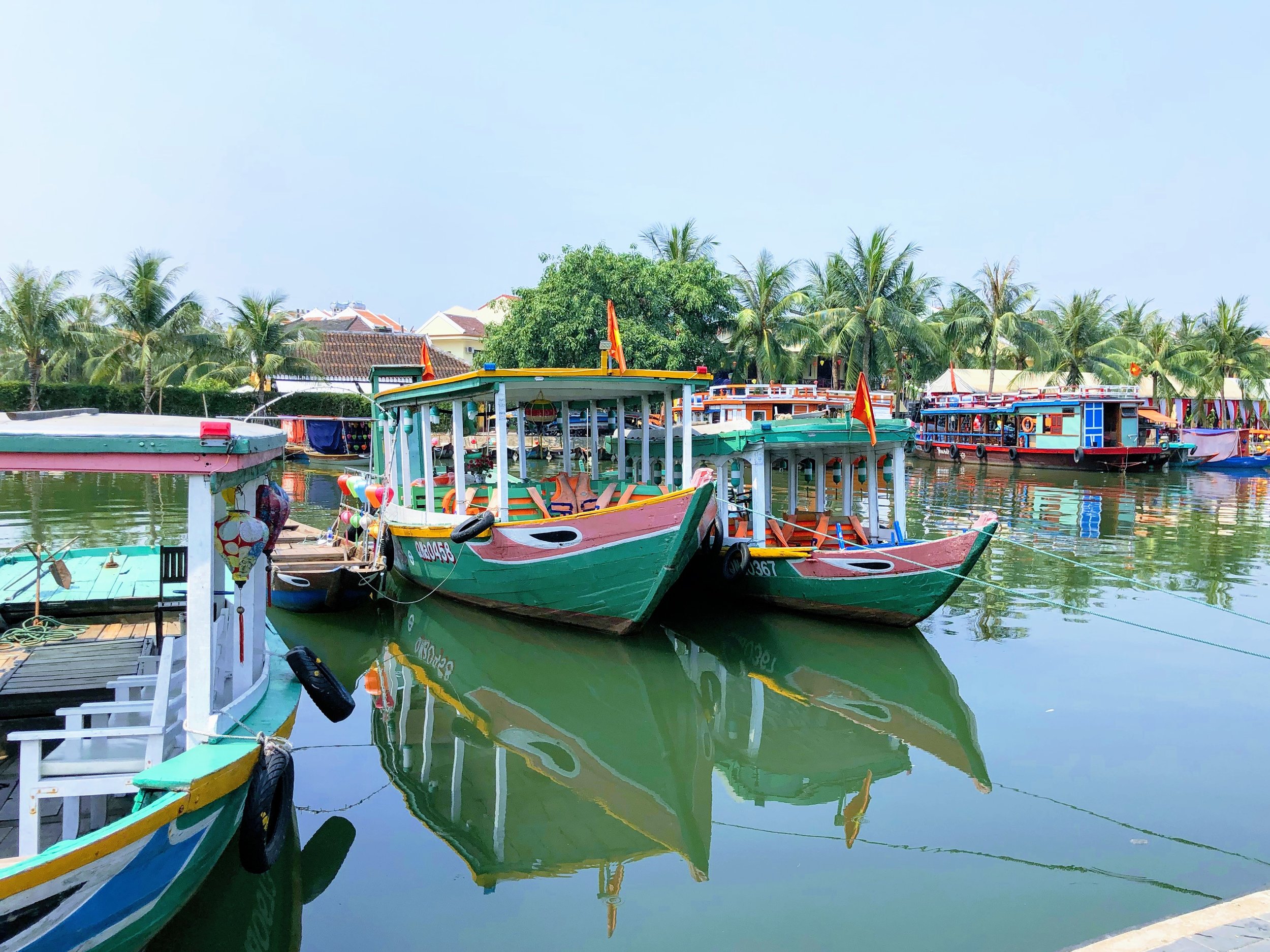  Boats docked along the river in Hoi An. 