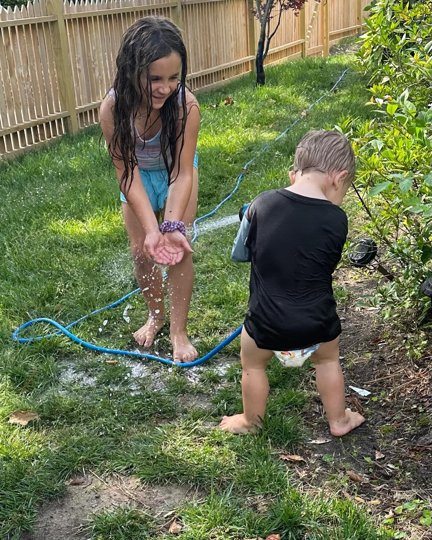 What happens when a 2 year old gets his hands in a hose! #summer #sisterandbrother
