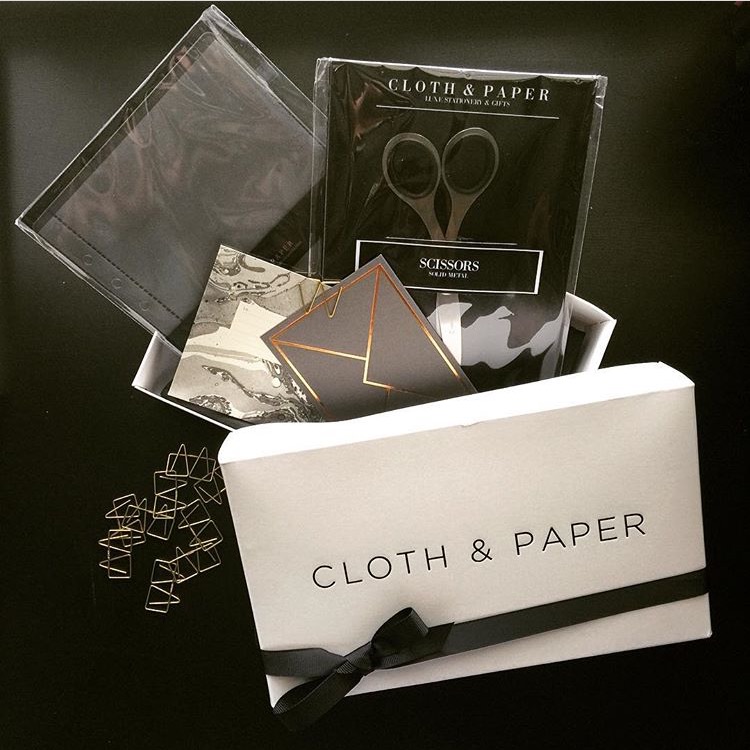 Cloth and Paper Penspiration and Stationery Box - $48 Cloth & Paper curate monthly stationery and pen subscription boxes and design luxe planners, dividers, inserts and accessories. Every month, subscribers receive a box full of Cloth & Paper exclusives, stationery goods, planner accessories, hard to find pens, and all types of fancy lifestyle items.