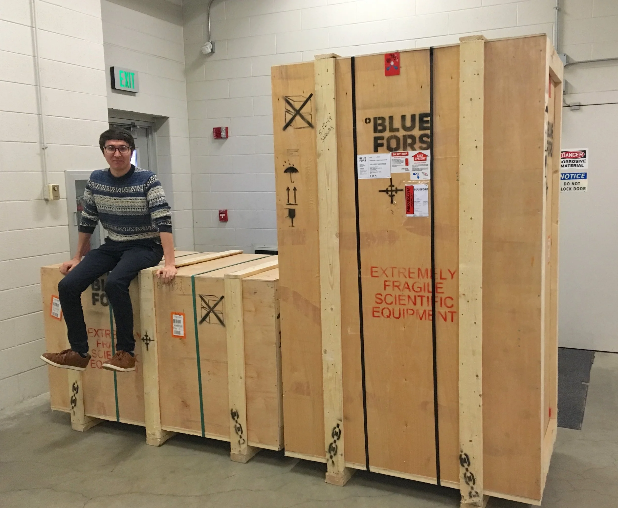 Dr. Niyaz Beysengulov enjoying the view from the “top” of a our new Bluefors LD400 dilution refrigerator.
