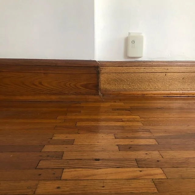 A single surface tells a hundred tales. .
.
Repairs from the removal of wall partitions, a perfect outline of prior cabinet placement left behind by the last refinishing, tar residue - evidence that vinyl sticky tile graced even the most timeless of 