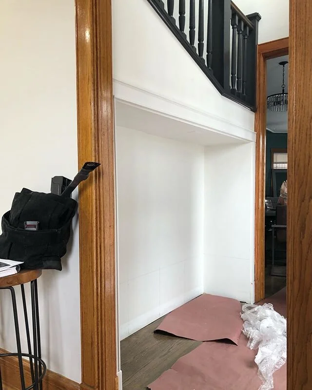 Providence. .
.
Formerly underused, this entry nook was begging to up its storage game + design appeal with a custom built coat cubby. .
.
Sneak a peek at the cubby color we&rsquo;ll be applying...Wrought Iron by @benjaminmoore which laces the oak sp