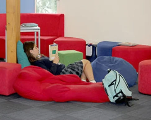 student lying in library.jpg
