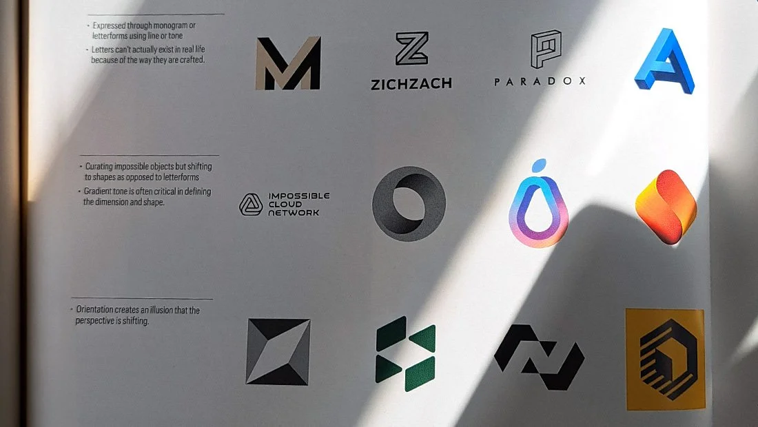 Insomniac Studios logo design appears alongside other impossible logo designs