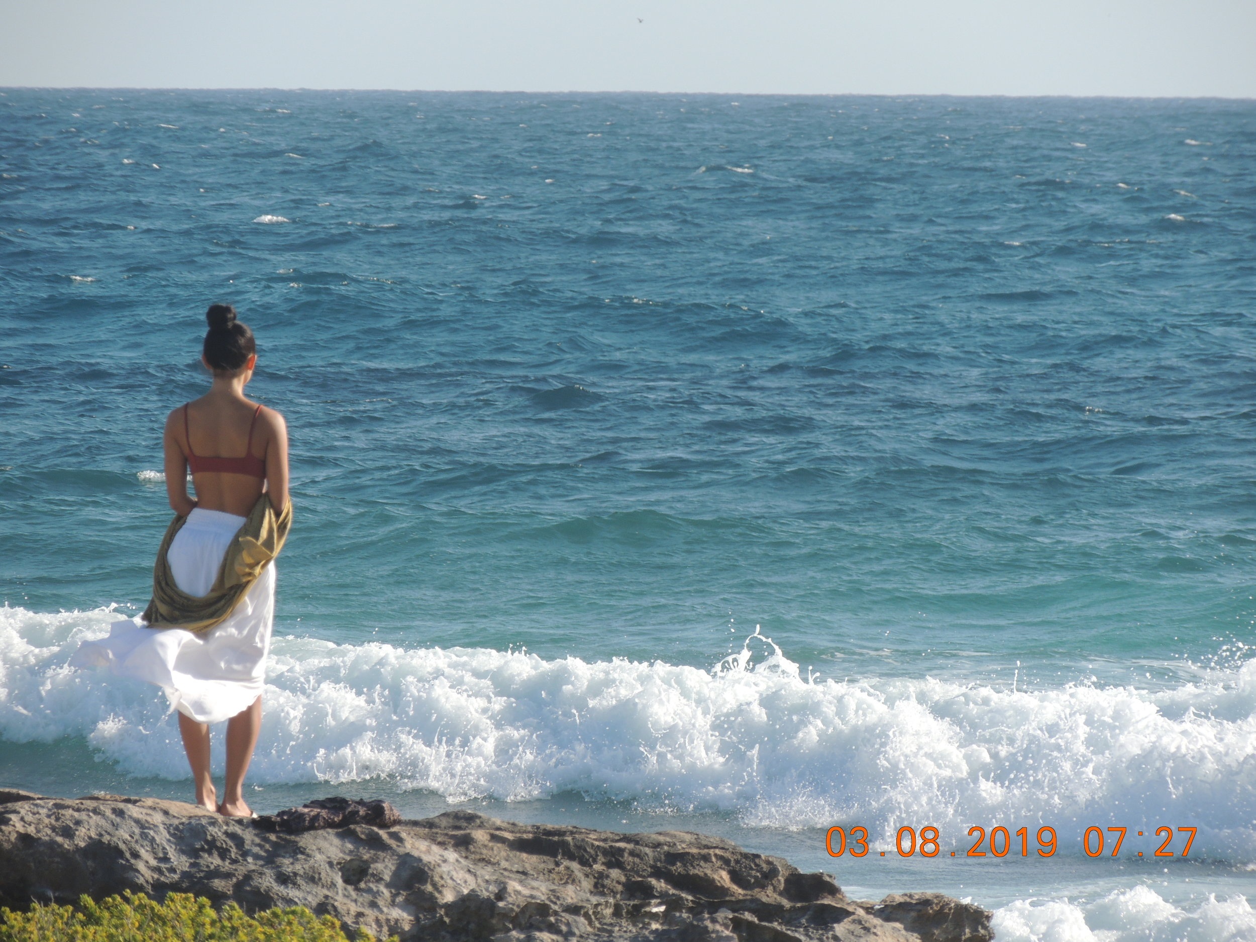 Girl on the rocks