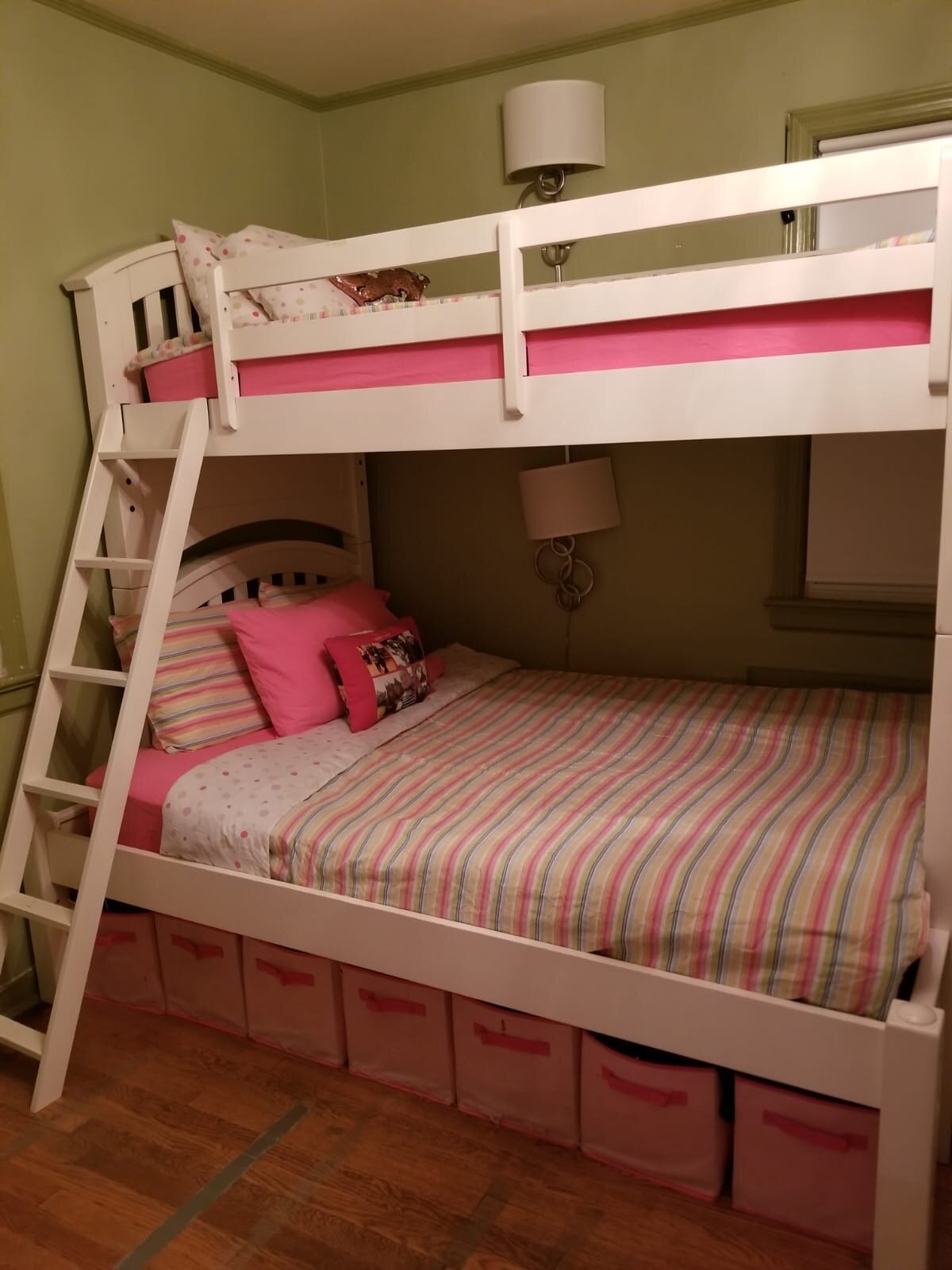 One beautiful solid wood white bunk bed with a pull out trundle!
