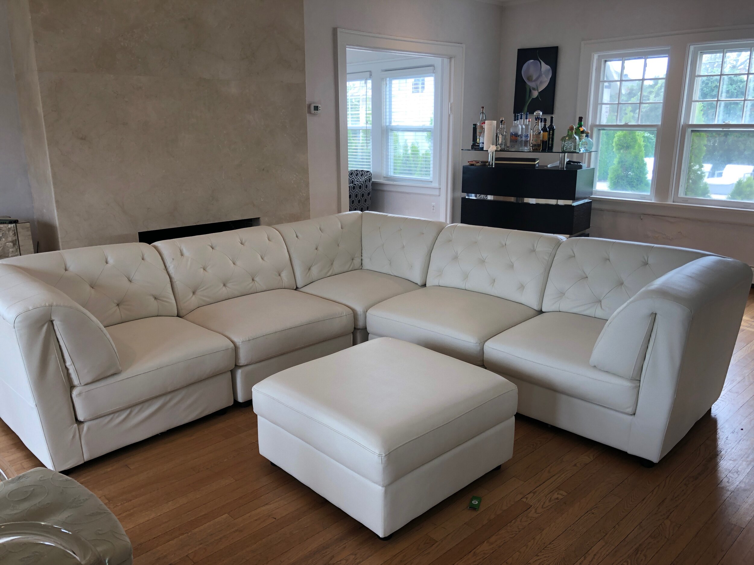 Spotless White Tufted Leather Couch