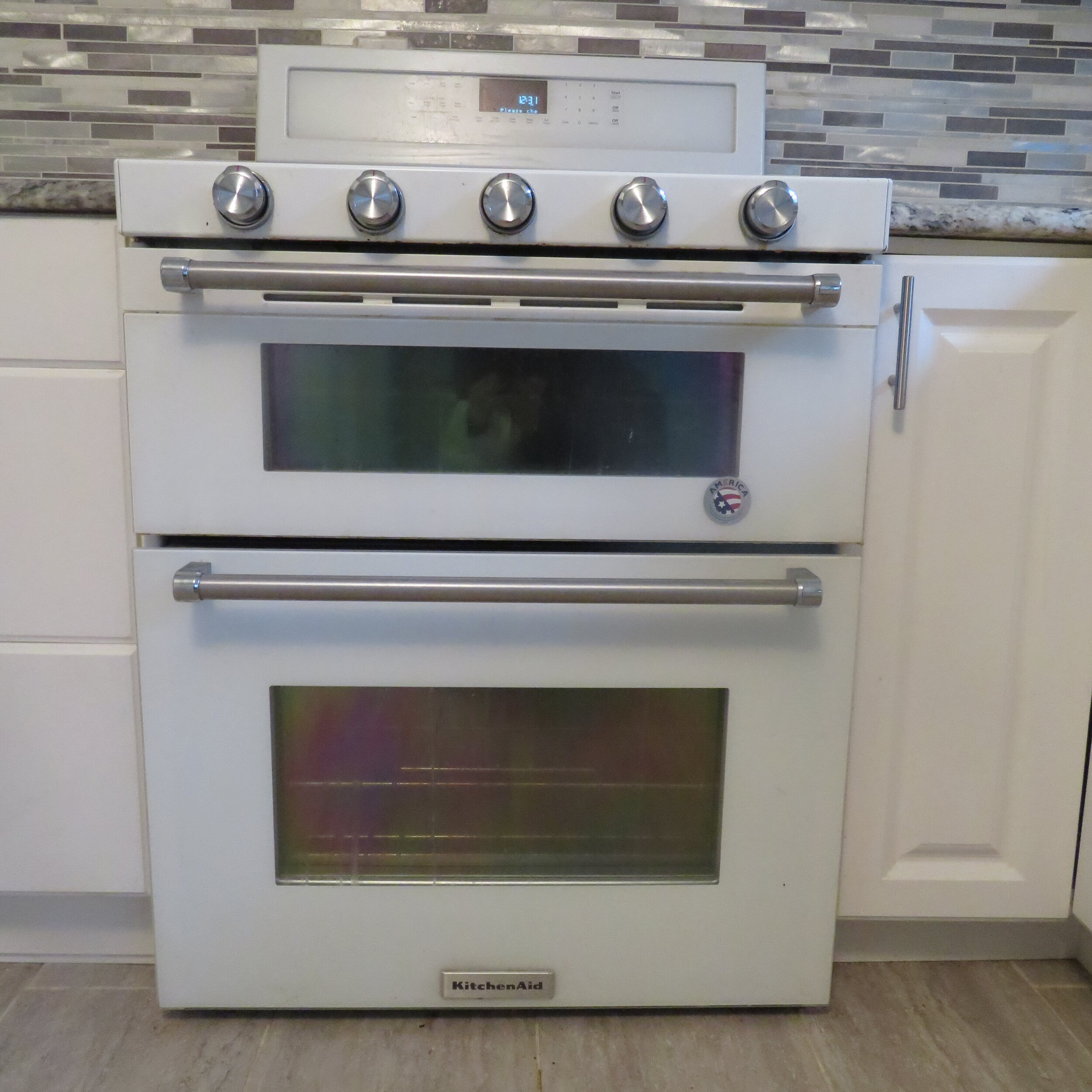 Kitchen Aid White Range and Microwave