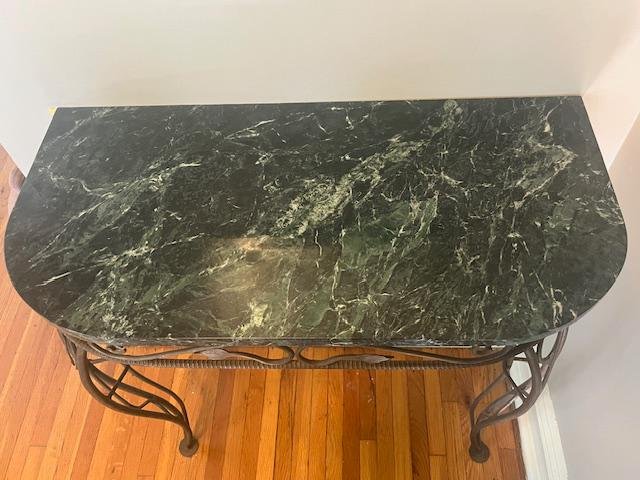Green marble top wrought iron console table