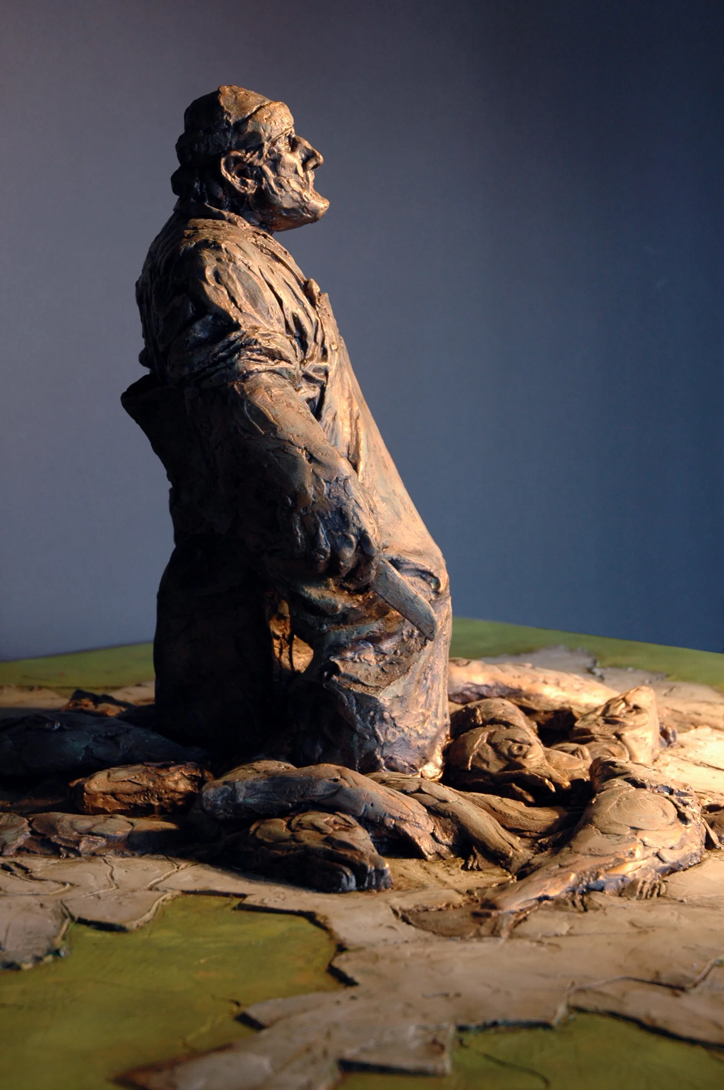 The flat codfish at the base would be cut in local granite and installed as pavers, creating a handsome transition between the grass "deck" and the monument.