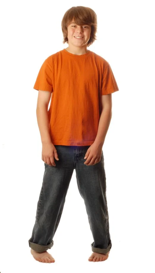 3461787_M-Child_boy_kid_standing_happy_intoe_intoeing_deformity_legs_feet_pointing inward.jpg