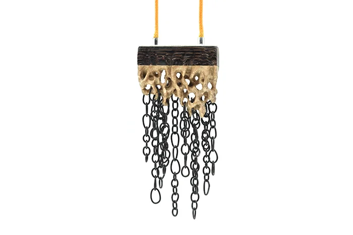 Cloudburst necklace, 2016 Walnut wood, maple wood, sterling silver, steel, wax cord