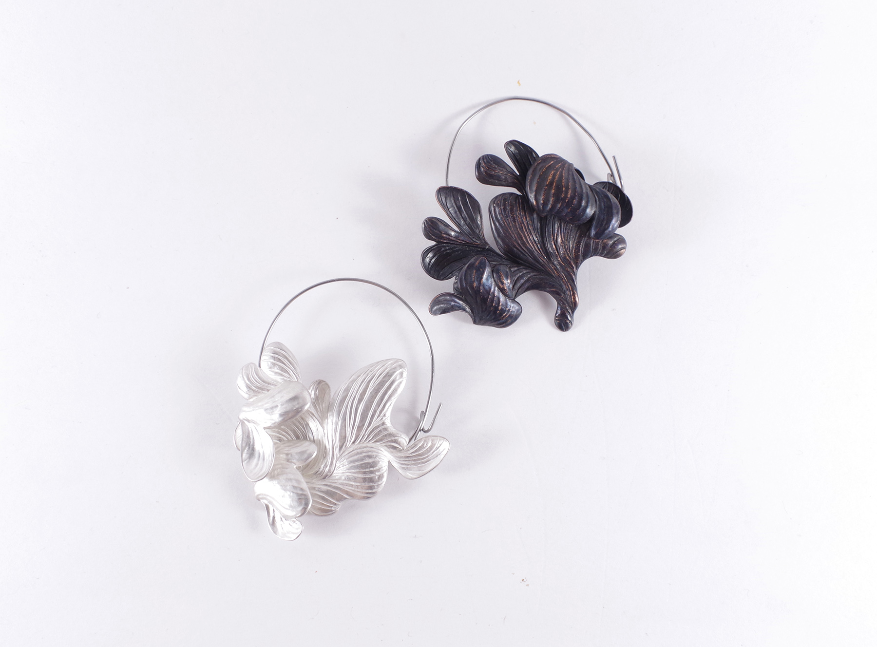 Flow/Fold (2018) Sterling silver, copper, steel pin