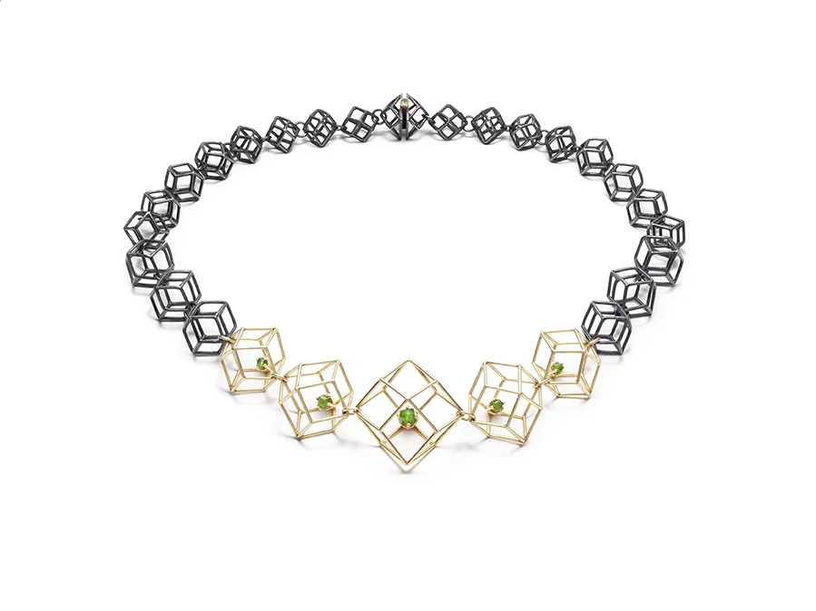 Francois Charest Granatus (2019) Sterling silver, 18k yellow gold, raw demantoid garnets (Jeffrey Mine, Asbestos, QC), tsavorite garnet Image by Anthony McLean
